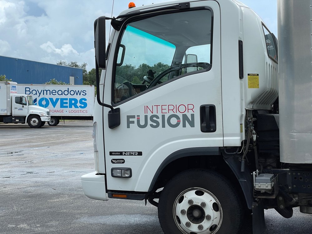 Interior Fusion and Baymeadows Movers trucks